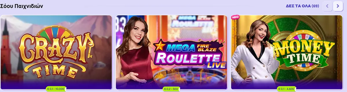 Spinbara “Σόου Παιχνιδιών” carousel showing three live casino titles: Crazy Time, Mega Fire Blaze Roulette Live (dealer pictured), and Money Time (NEW), with bet limits displayed beneath each card.